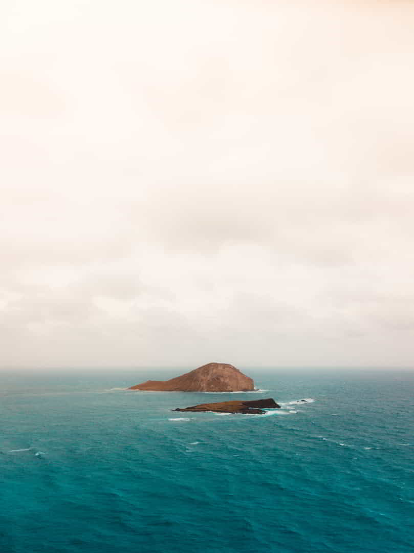 wandbild-kleine-insel-im-ozean-natur-landschaft wandbild kleine insel im ozean natur landschaft