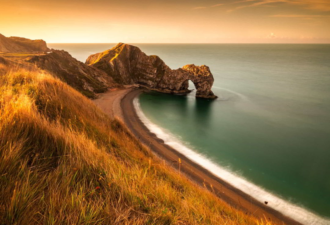 wandbild-sonnenuntergang-an-den-klippen-natur-landschaft